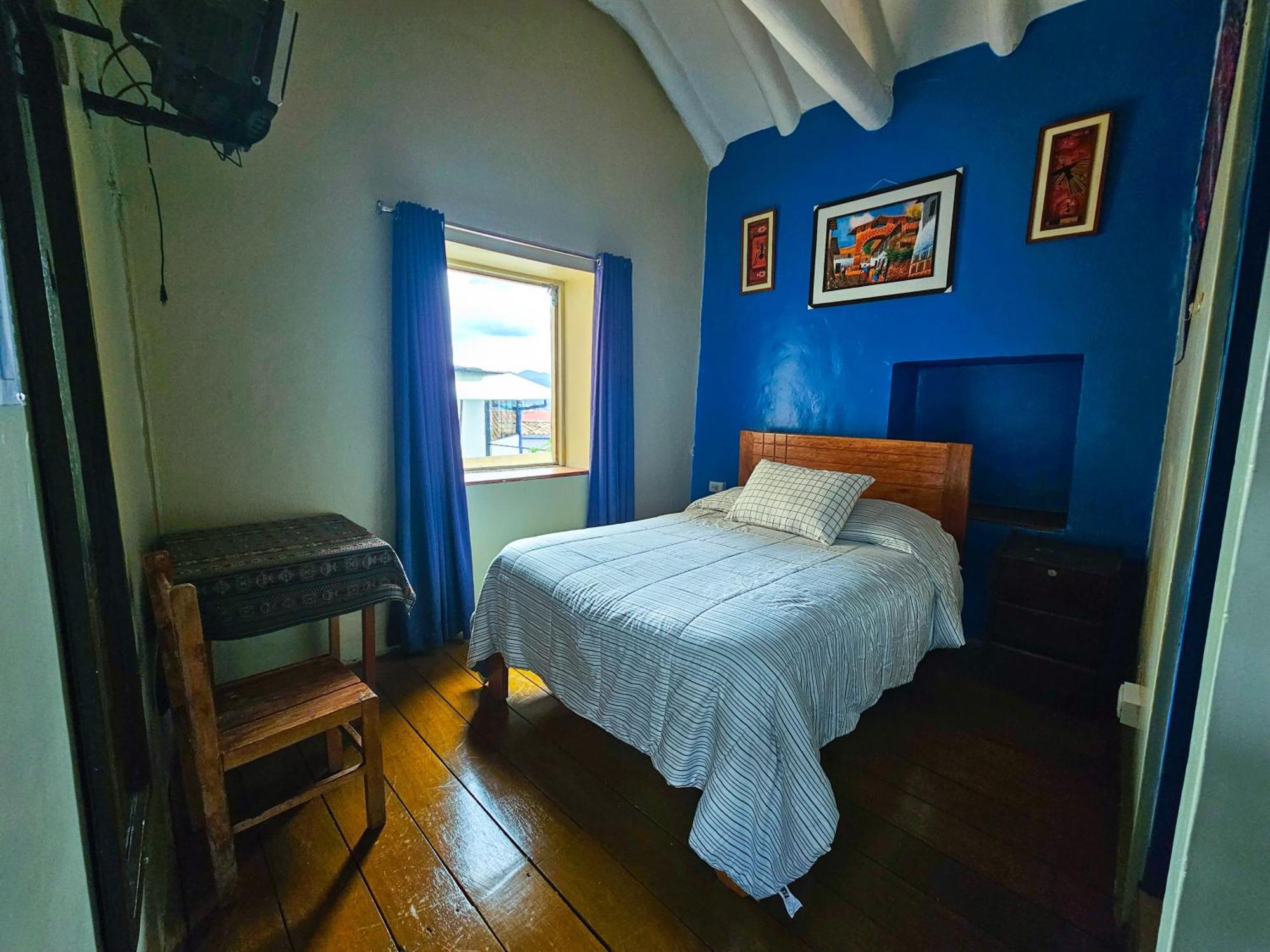 Quarto com Cama Queen-size