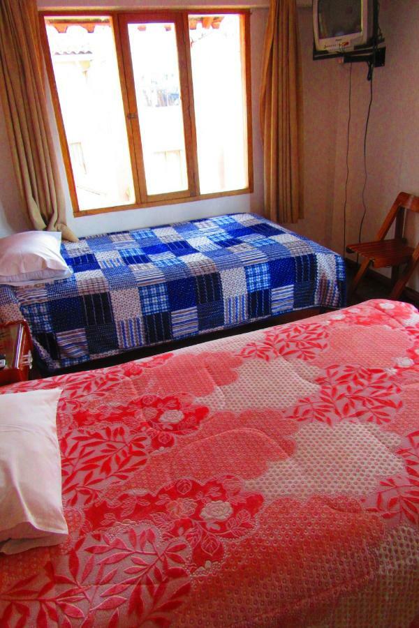 Quarto com 2 Camas de Solteiro